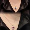 Red Elk Damen s925 Sterlingsilber Roter & Blauer Saphir Vintage Anhänger Halskette