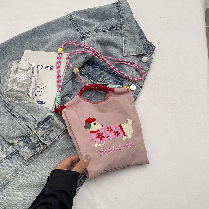 

Women s same printed women s bag shoulder bag nylon bag waterproof shoulder bag fashion canvas bag portable messenger bag рожевий