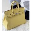 Leather Handbag With Silver Lock For Elegant Women Day Use