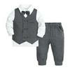 Completo formale per ragazzo in stile britannico: Completo due pezzi: Camicia con papillon, Bretelle e Pantaloni lunghi.