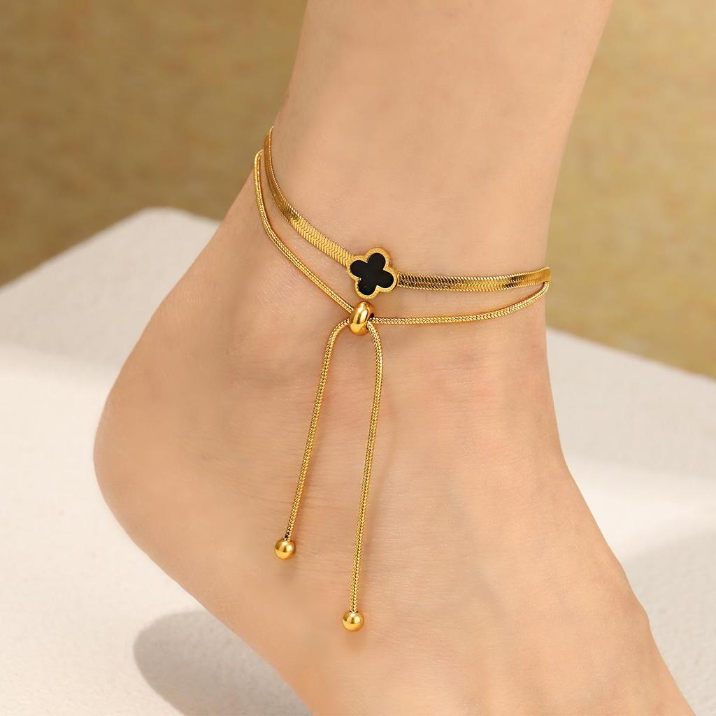 European Light Luxury Four-Leaf Clover Anklet, Titanium Steel Snake Bone Chain, Gold Beach Foot Jewelry for Women.