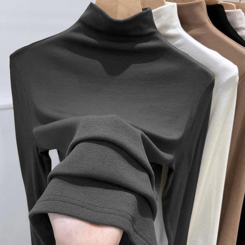 For Autumn and Winter, Women Can Wear A Semi-high-neck Solid-color Base Layer and A Long-sleeved T-shirt Over It for A Slimming Look