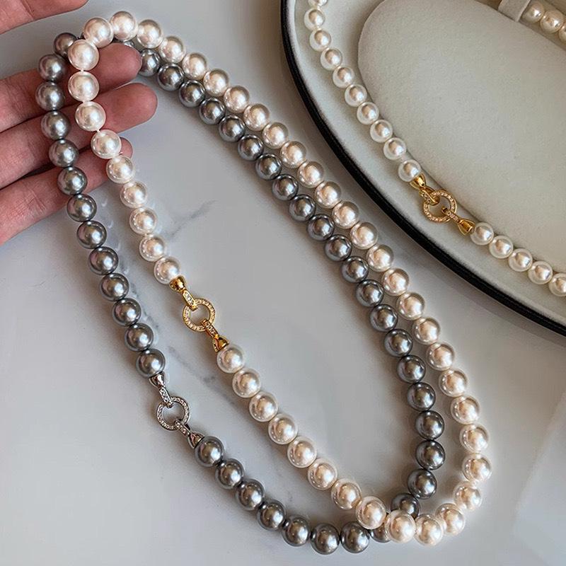 New Elegant Multi-layer Pearl Sweater Chain Necklace - Light Luxury Pendant for Women