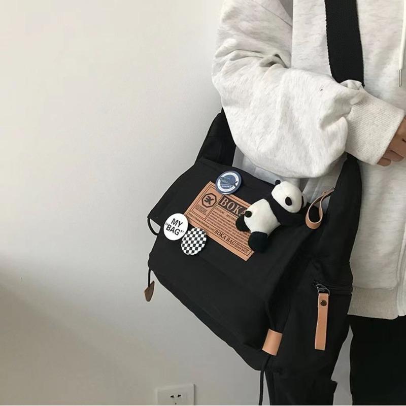 Harajuku dark tooling wind messenger bag female street large capacity mailman bag male