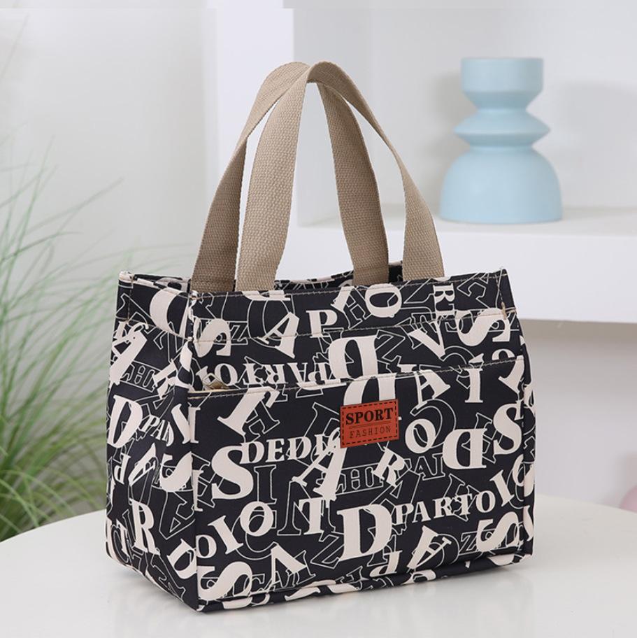 Large-capacity waterproof Oxford cloth niche bag, new versatile office worker handbag, mommy bento