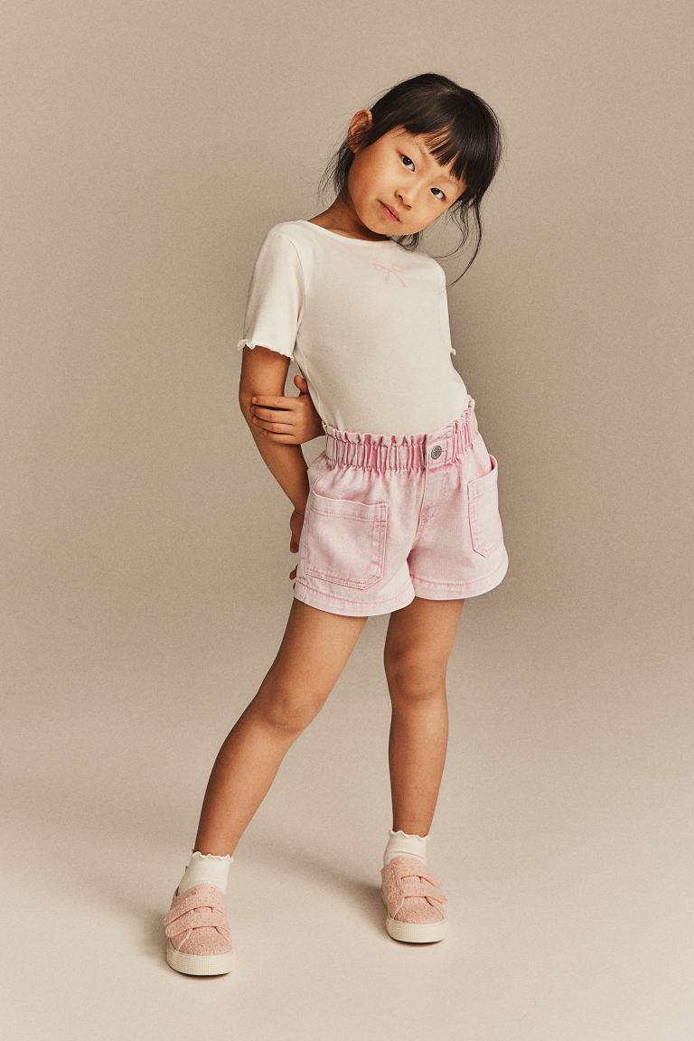 

Джинсовые шорты свободного кроя HM светло-розовые