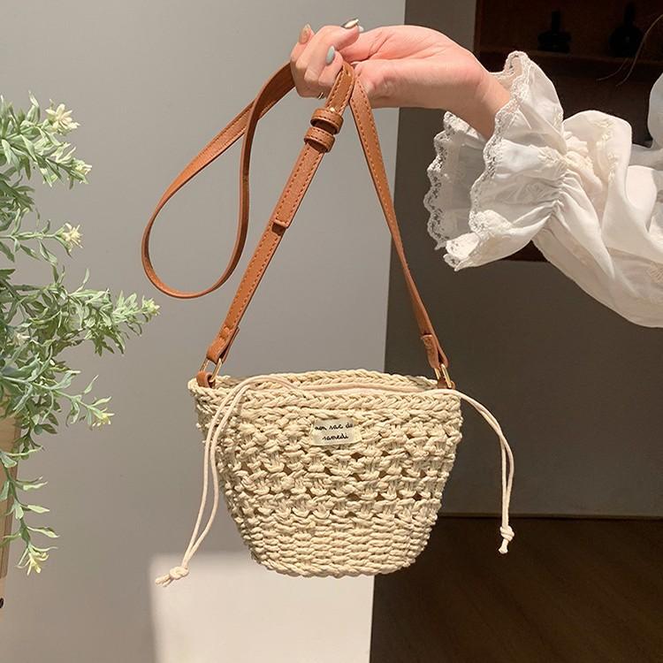 Cute bucket crossbody straw woven bag new small fresh hollow shoulder woven bag vacation beach bag versatile women's bag