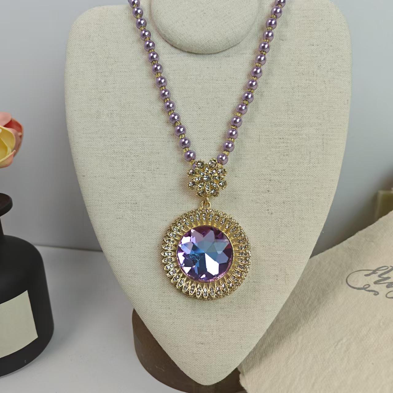 

Purple Pearl Long Necklace for Women: Luxurious Fall/Winter Accessory for Sweaters, Cheongsams, and More.