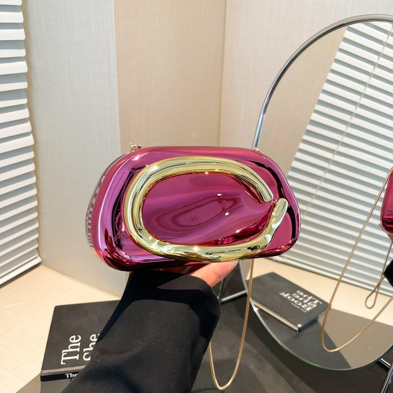 

2025 women s European and American new shoulder messenger bag, special-shaped shell acrylic bag, fashion niche dinner clutch bag рожевий