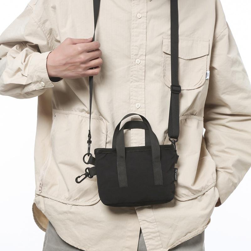 Crossbody bag women's small bag 2025 new foreign style personalized solid color portable simple shoulder bag trendy casual bucket bag