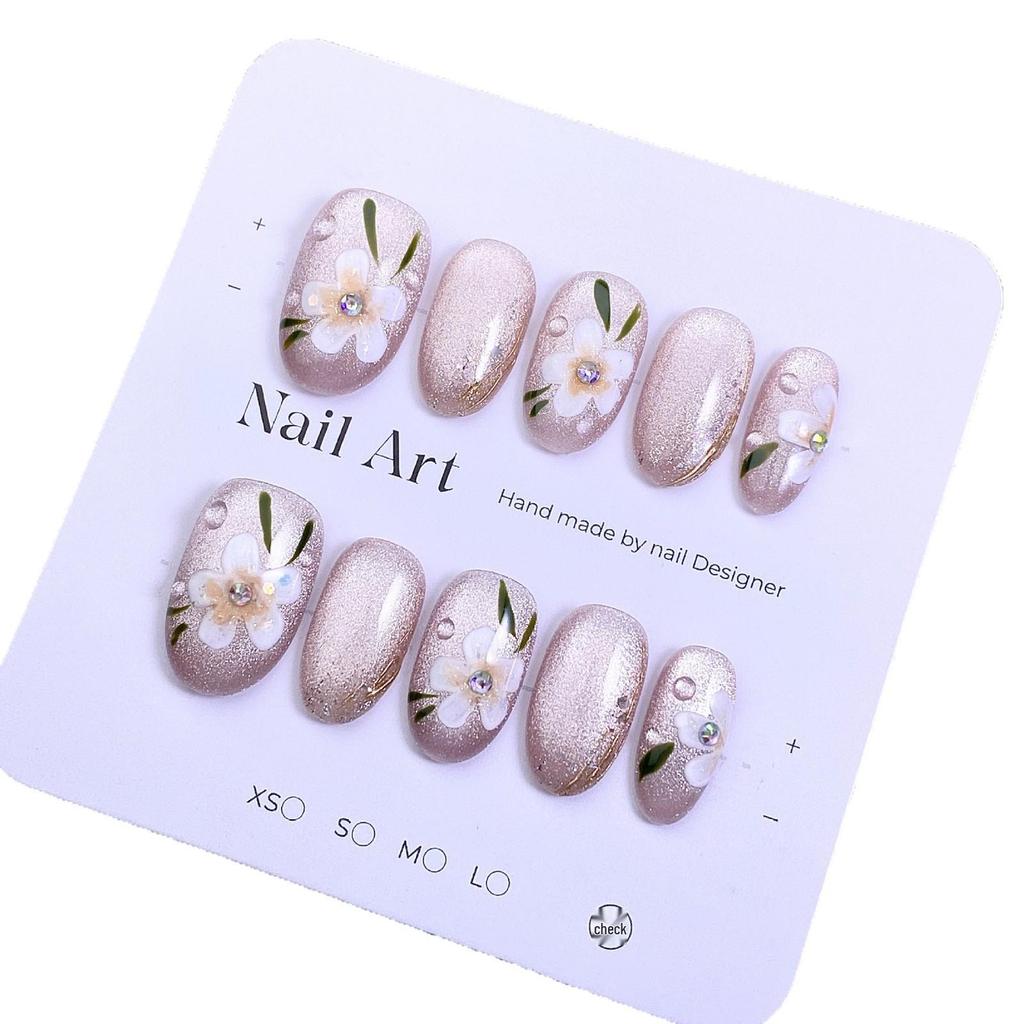 Hot-Selling Hand-Painted Floral Cat Eye Nail Tips - Ice Transparent Nude, Gentle Style Wearable Nails.