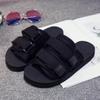 Summer Cool Slippers Men's Trend Korean Version Personalized Outdoor Wear One-word Drag Couple Student Non-slip Beach Sandals