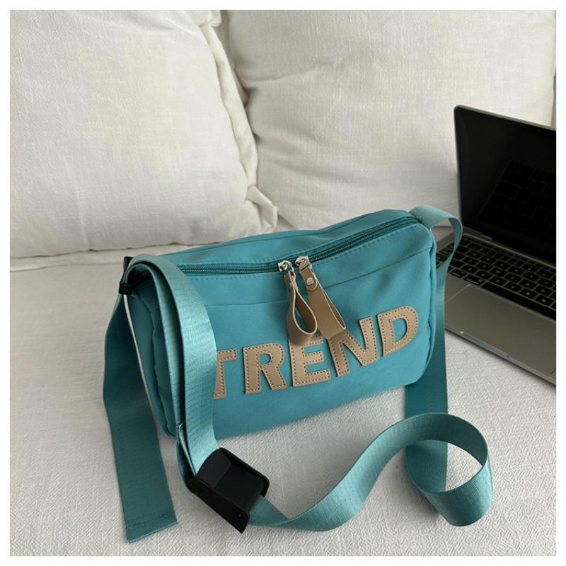 

New Oxford cloth bag, letter shoulder bag, male and female couples messenger bag, large capacity holder. павлин голубой