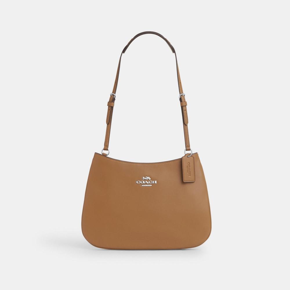 

Сумка через плечо Coach Penelope, серебряное легкое седло