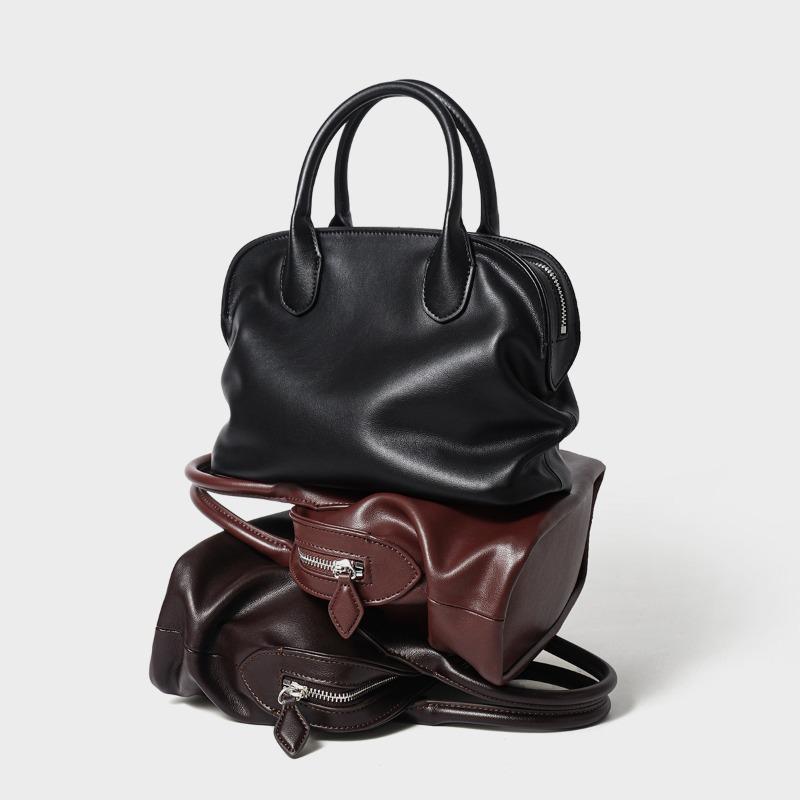 Niche design retro cowhide fashion shell handbag versatile new leather large-capacity shoulder handbag