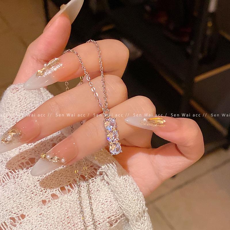 Korean retro titanium steel necklace women's versatile high-end pearl pendant ins wind niche collarbone chain jewelry wholesale