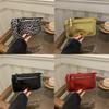 Trendy Small Square Bag With Decorative Stitching For Casual Outings And Shopping