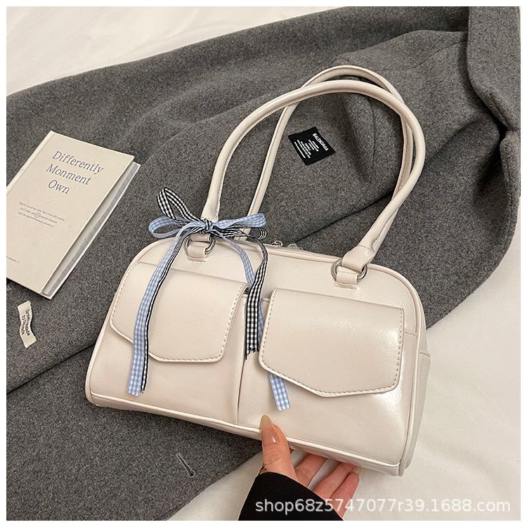 Korean Internet celebrities with the same bowling bag 2025 new niche Boston shoulder bow portable underarm women's bag