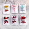 Prendas e souvenires – Postais