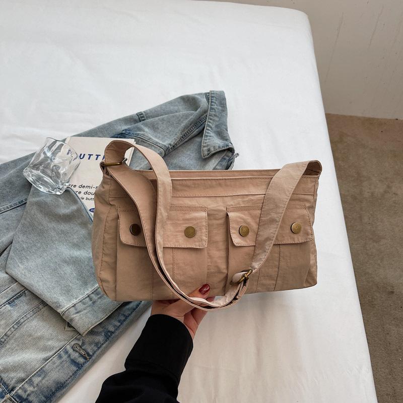 

Casual messenger bag 2025 summer new canvas bag student class bag simple trend solid color shoulder messenger bag хакі