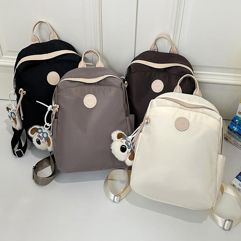Niche design backpack women's new commuter versatile travel backpack student casual mini schoolbag