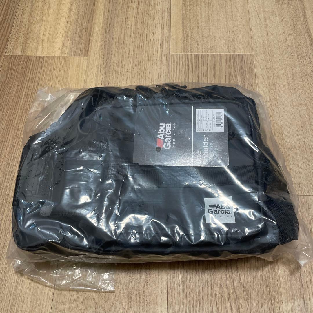 Used Abu Garcia one shoulder bag with bonus