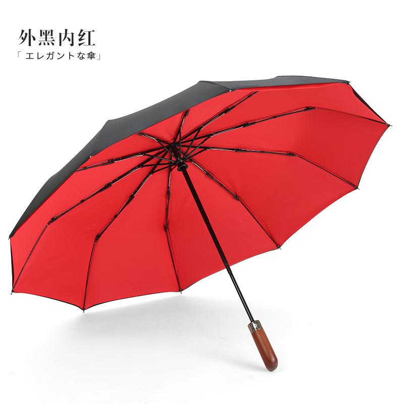 Fully automatic 10-bone wind-resistant solid wood handle lettering three-fold men's umbrella umbrella plus umbrella