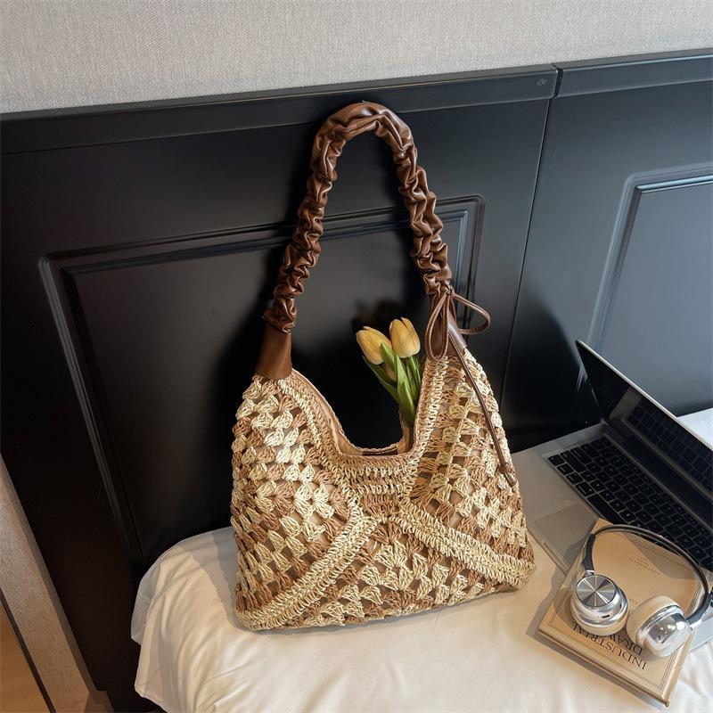 

New lazy wind straw woven bag women s seaside vacation woven armpit bag single shoulder large capacity commuter tote bag