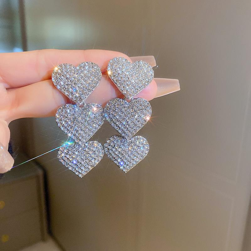 European and American Exaggerated Diamond-encrusted Flower Bow Fringed Earrings Personalized Earrings Internet Celebrity Temperament Earrings