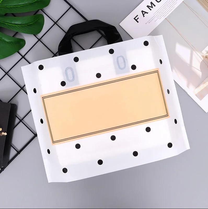 50pcs New models Handbag thick 0.14mm durable clothing cosmetic gift Shopping bags Resilient Powerful handheld Portable Packaging bag