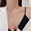 Copper-Plated Gold Four-Leaf Clover Tassel Pendant Necklace - Elegant, Minimalist, and Luxurious.