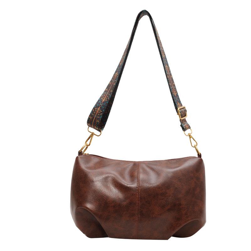 

Популярная в этом году новая 2025 года высококлассная однотонная сумка через плечо с чувством темперамента, нишевая широкополосная сумка-мессенджер