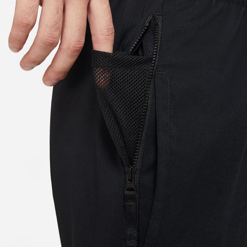 Nike Men's Loose Fit Tapered Woven Track Pants