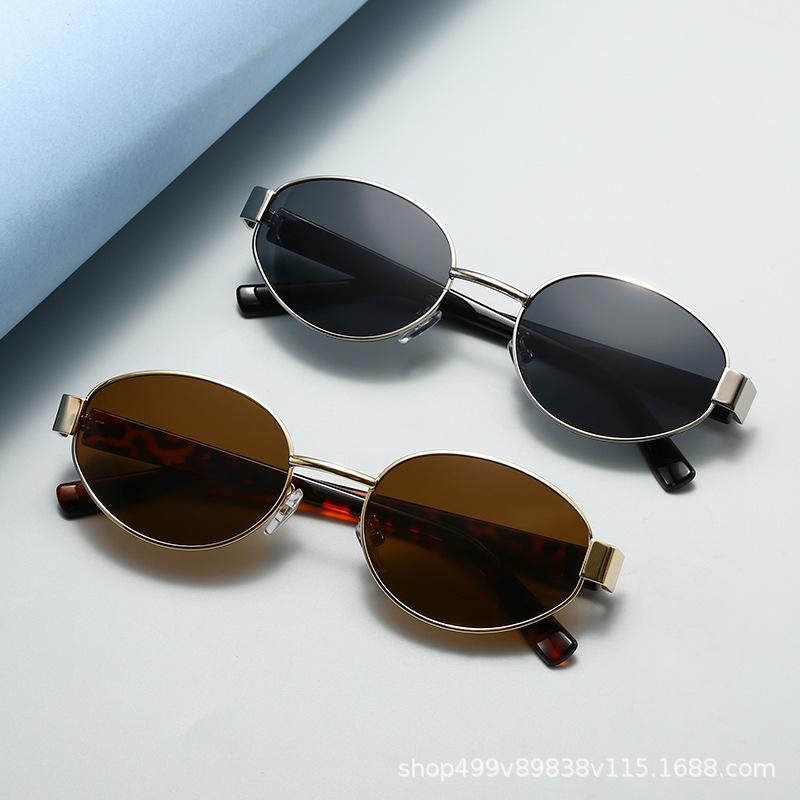 Metal oval frame retro sunglasses women's high-end sunglasses Hong Kong style personalized sunscreen glasses moisture polarized light