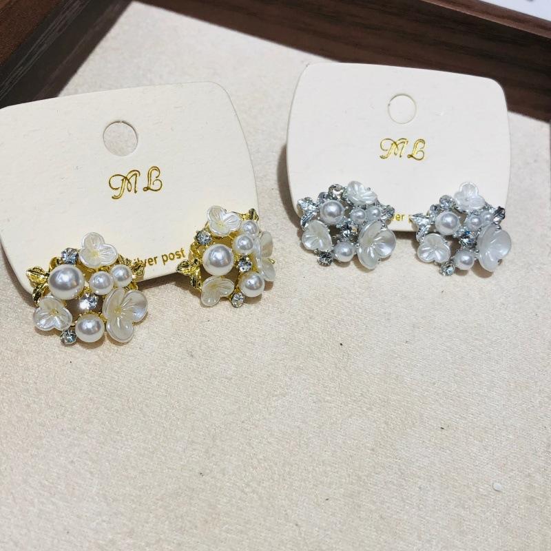 Vielseitige Perlenblumen-Ohrstecker S925 Silberstift Nische Modedesign Sinn Hochwertiger Schmuck Großhandel