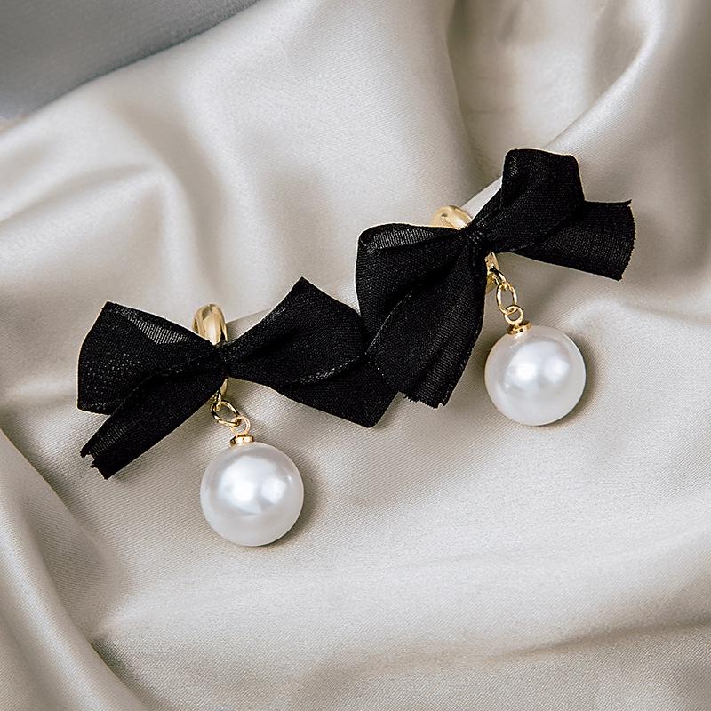 

Silver Needle Long Tassel Pearl Bow Earrings