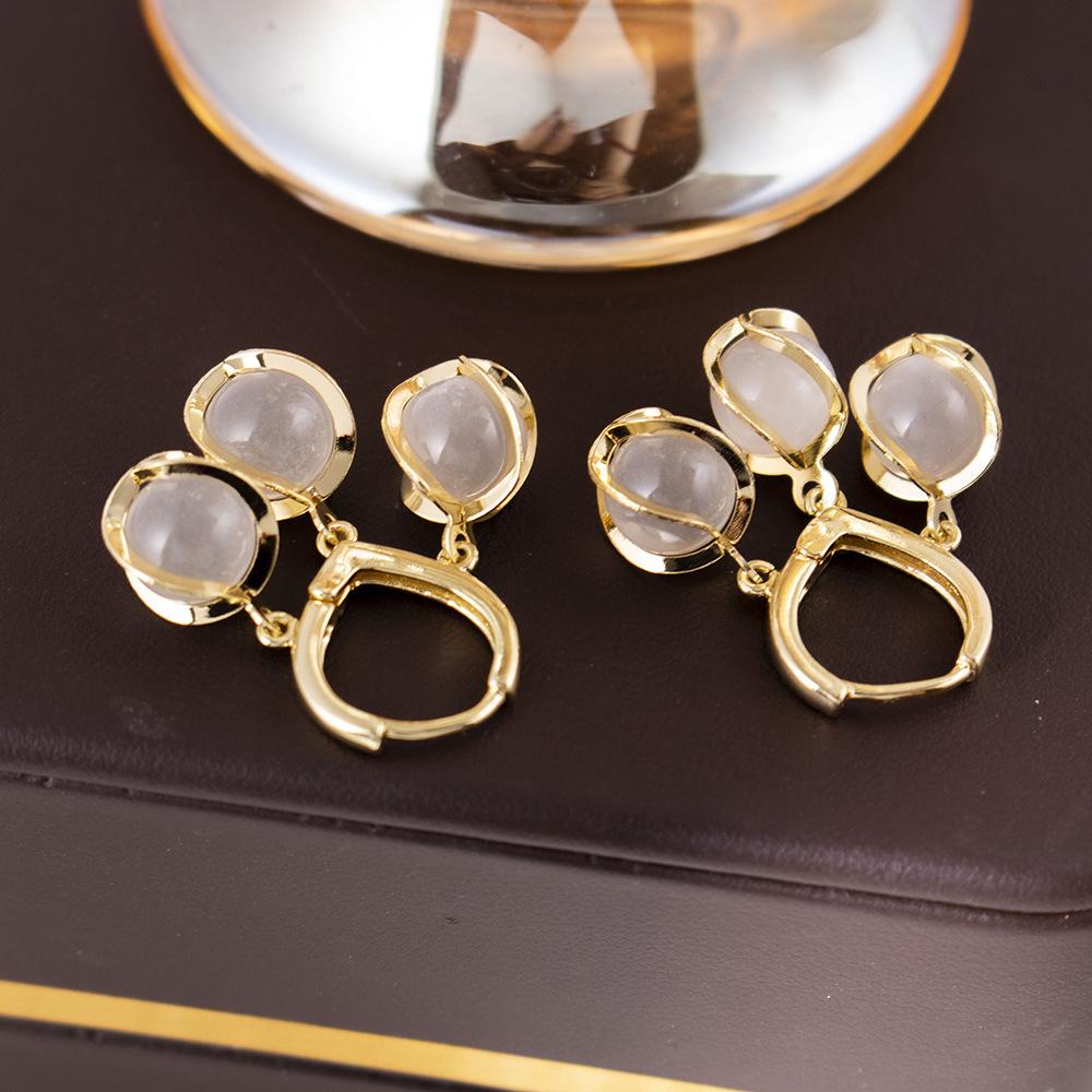 Silberne Nadel Katzenaugenstein Blume Ohrringe - Elegantes, vielseitiges Modeaccessoire für Frauen
