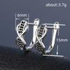 Infinity Design Huggie Hoop Earrings for Women with Black Stone Accents Silver Tone Earrings for Daily and Night Out