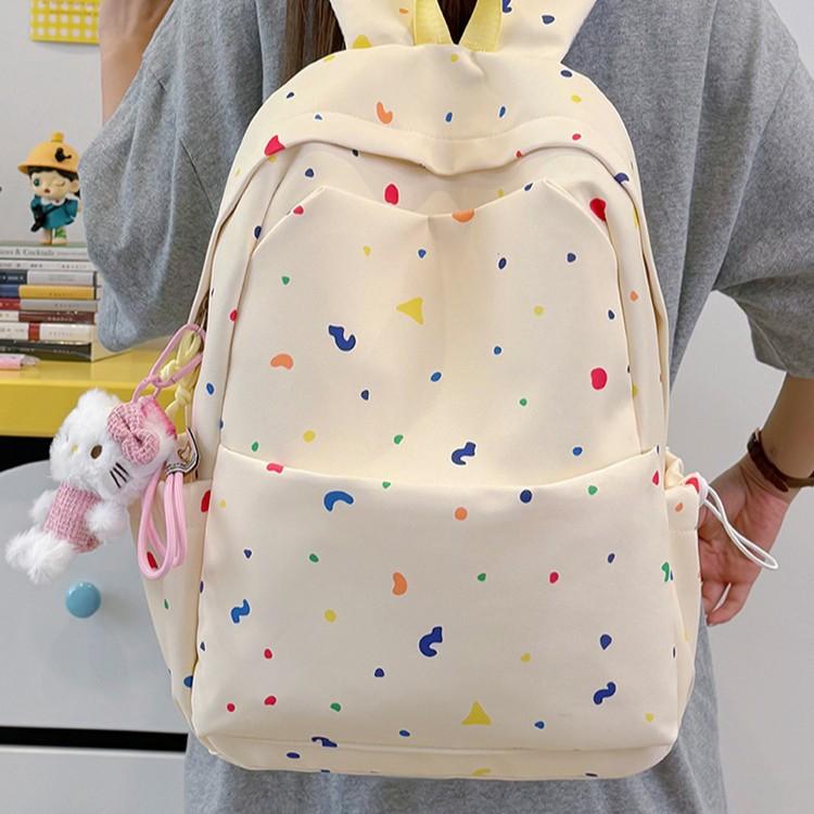 Schoolbag wholesale summer new junior high school girl heart floral shoulder large capacity simple new versatile travel backpack