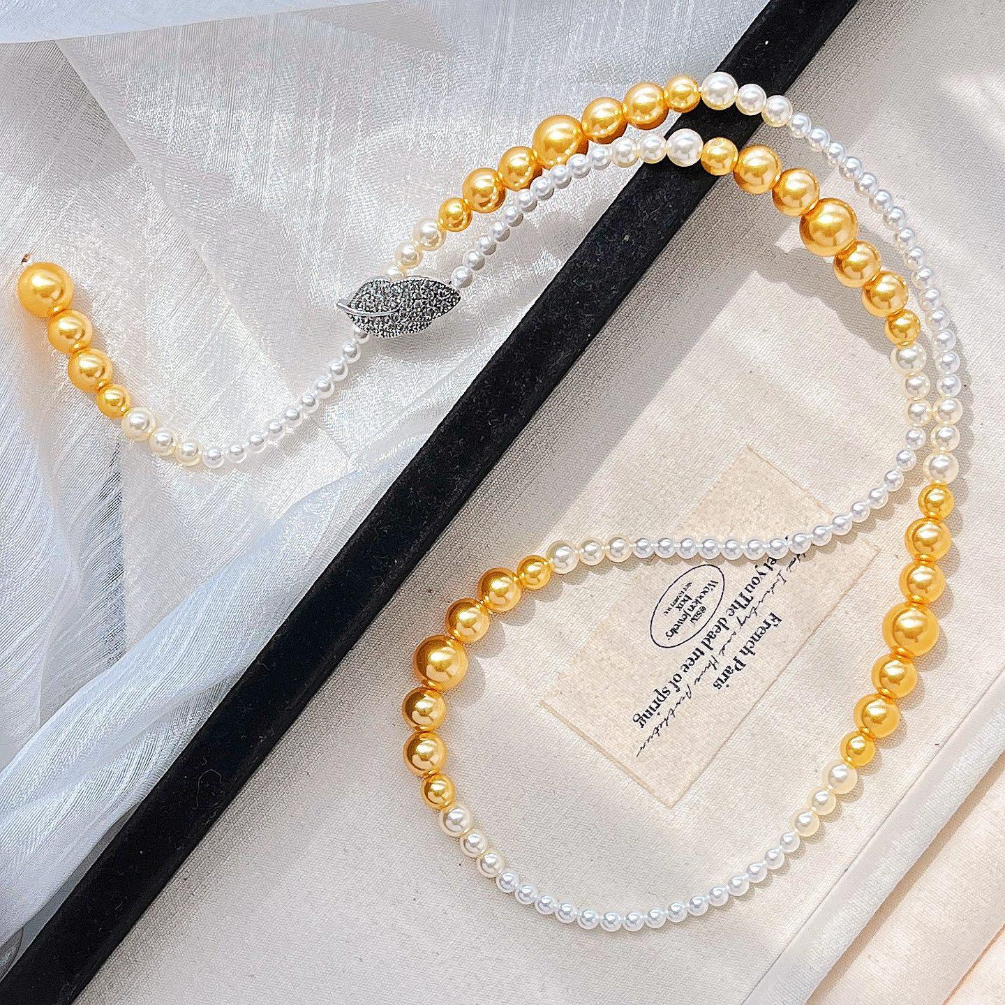 

Autumn And Winter Maillard High-Gloss High-Quality Shijia Pearl Mix Only Gradual Change Smile Collarbone Chain Sweater Chain Necklace Female