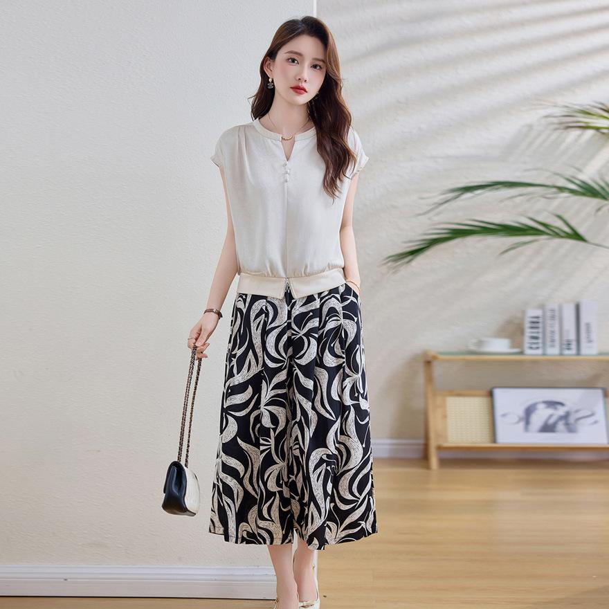 

Fashion short-sleeved top set summer new temperament versatile printed wide-leg pants two-piece set XXXL