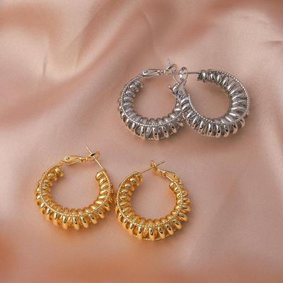 Women's High-End Light Luxury Twisted Hoop Earrings - Stylish, Colorfast, Exaggerated Design for Round and Square Faces.