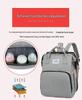Portable Folding Mummy Bag: Lightweight, Large-Capacity Mother & Baby Backpack with Multi-purpose Bed Feature.