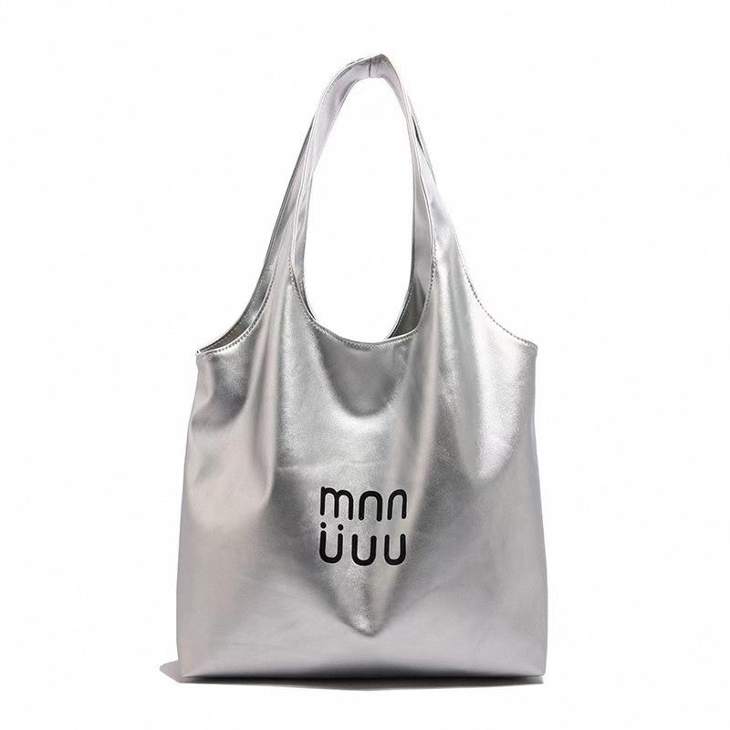 

2025 new Korean version single shoulder large capacity tote bag women s fashion commuting casual single shoulder armpit bag серебряный