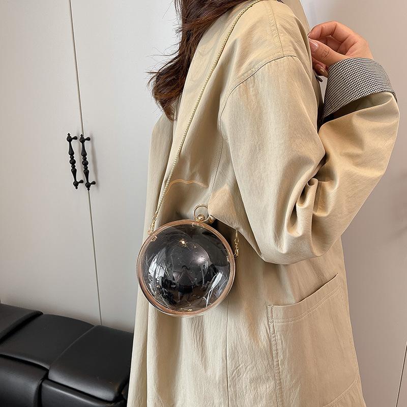 Borsa da sera rotonda in acrilico 2025 Nuova moda di nicchia Borsa a mano versatile da donna Borsa rotonda piccola con catena