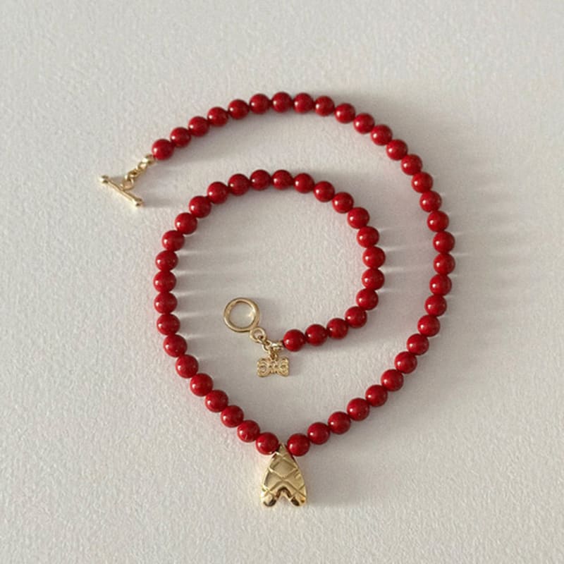 

BORNETE COLLECTION_DE LOVER_Check volume in pearl necklace onyx