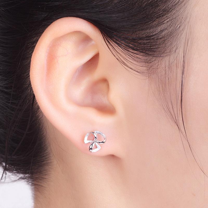 Fashionable Four-Leaf Clover Stud Earrings for Women - Sweet, Hollow Design in Japanese & Korean Style