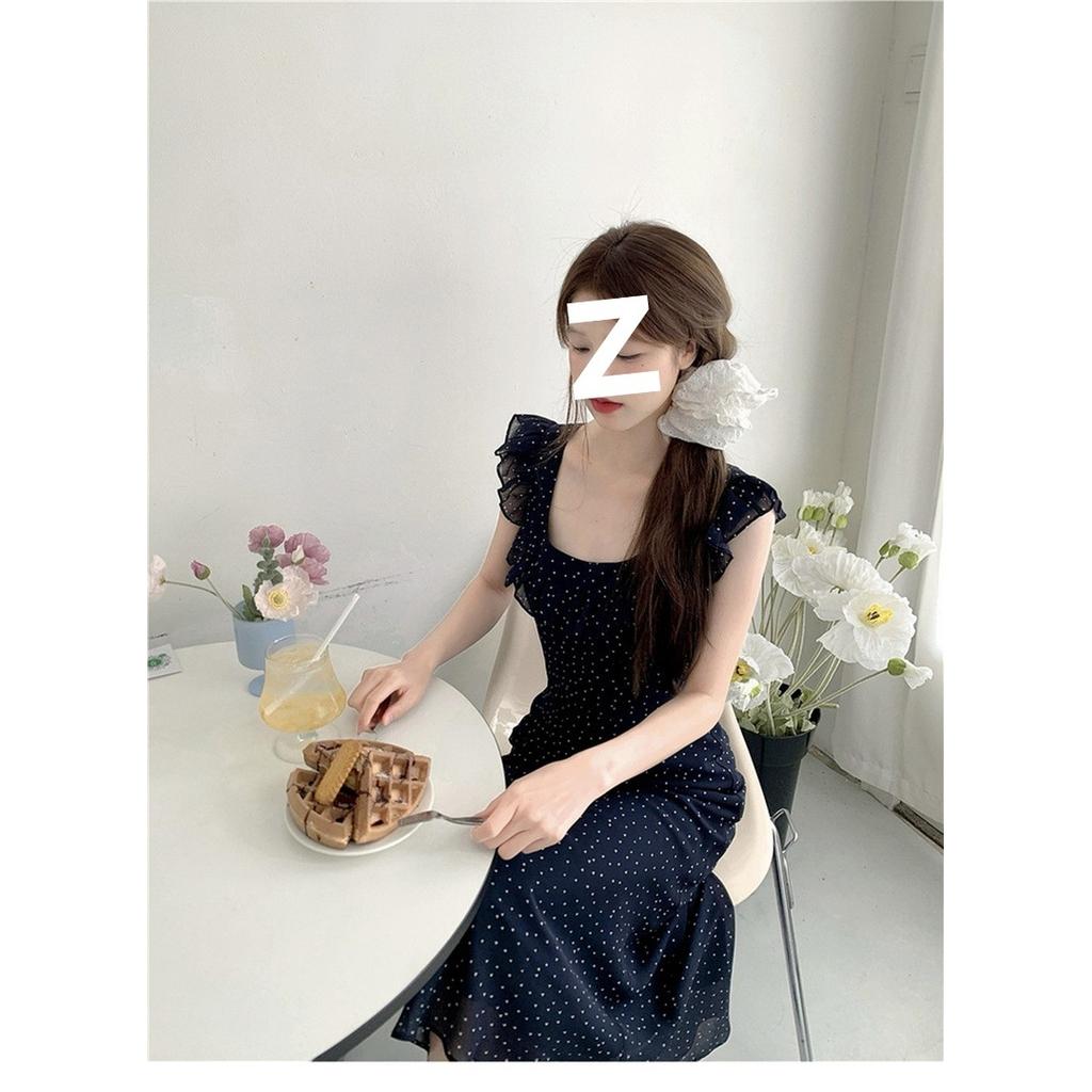 Polka dot navy blue suspender dress women's French coffee break medium and long dress waist and thin new fashion temperament long dress tide