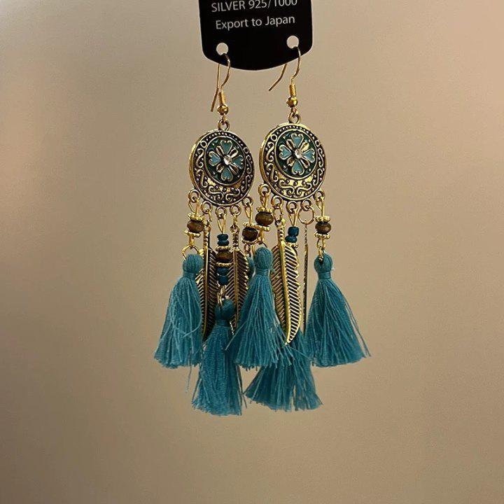 Retro Ethnic Bell Tassel Earrings: Exquisite, Fashionable Dangle Design with Light Luxury Appeal.