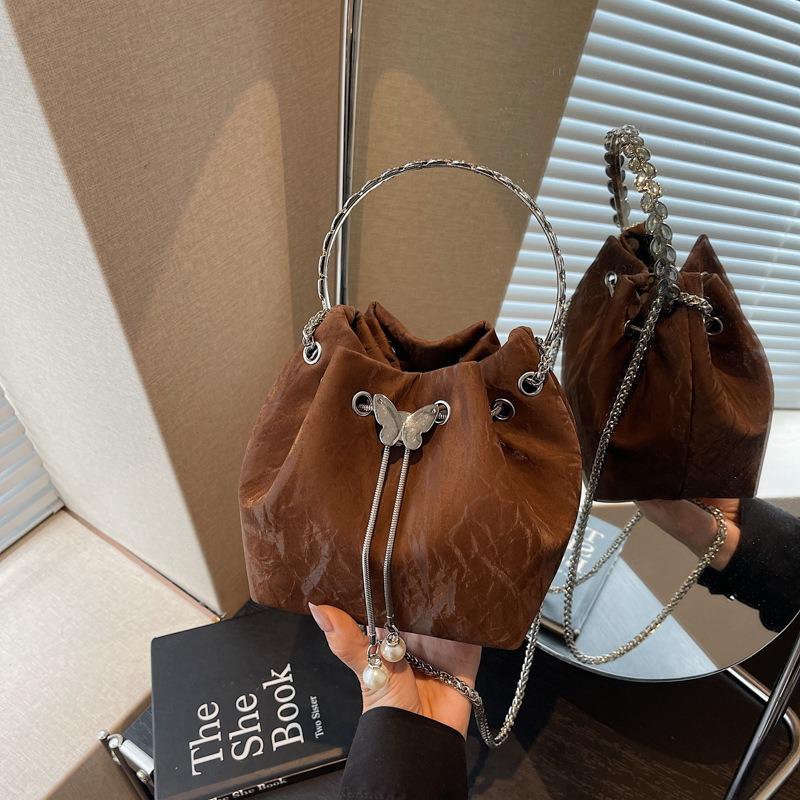 

Textured small bag women s autumn and winter new portable bucket bag premium chain messenger bag темно-коричневого кольору